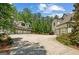 Spacious home featuring a long driveway and an attached four-car garage, perfect for car enthusiasts at 193 Stonegate Trl, Carrollton, GA 30116