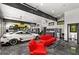 Luxury garage interior featuring a seating area and sleek flooring for car enthusiasts at 193 Stonegate Trl, Carrollton, GA 30116