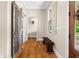Hallway featuring hardwood floors and a barn door at 193 Stonegate Trl, Carrollton, GA 30116