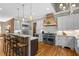 Modern kitchen with stainless steel appliances, white cabinets, and a kitchen island with seating at 193 Stonegate Trl, Carrollton, GA 30116