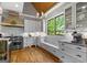 Bright kitchen featuring stainless steel appliances, island seating, and a cozy breakfast nook at 193 Stonegate Trl, Carrollton, GA 30116