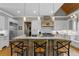 Bright kitchen featuring white cabinets, stainless steel appliances, and wood countertops at 193 Stonegate Trl, Carrollton, GA 30116