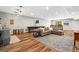 Spacious living room area with modern lighting and hardwood floors at 193 Stonegate Trl, Carrollton, GA 30116