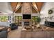 Bright living room with stone fireplace and access to outdoor space at 193 Stonegate Trl, Carrollton, GA 30116