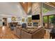 Open-concept living room with fireplace and wood floors at 193 Stonegate Trl, Carrollton, GA 30116