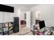 Office space with desk, shelving, and view to bathroom and additional room at 210 Kestrel Cir, Covington, GA 30014