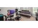 Bright home office with modern desk, comfortable seating, and ample natural light at 210 Kestrel Cir, Covington, GA 30014