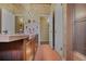 Long vintage bathroom features tile floor, vanity, and shower at 3408 Chestnut Dr, Doraville, GA 30340