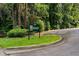 Northwoods Montessori sign in a landscaped setting, with lush greenery at 3408 Chestnut Dr, Doraville, GA 30340