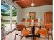 Dining room with a glass-top table and a view of the backyard at 3408 Chestnut Dr, Doraville, GA 30340