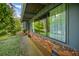 Exterior brick detail under a window offering view of lush landscaping at 3408 Chestnut Dr, Doraville, GA 30340