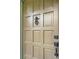 Elegant front door with a decorative knocker and secure locking mechanisms at 3408 Chestnut Dr, Doraville, GA 30340