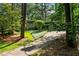 Charming home exterior with a lush green lawn and inviting curb appeal at 3408 Chestnut Dr, Doraville, GA 30340