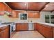 Functional kitchen showcases stainless steel appliances, bright countertop, and a window with natural light at 3408 Chestnut Dr, Doraville, GA 30340