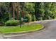 Northwoods Montessori sign set in landscaped area with green grass and paved parking lot at 3408 Chestnut Dr, Atlanta, GA 30340