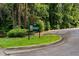 Sign for Northwoods Montessori, founded in 1972, set on a green grassy area at 3408 Chestnut Dr, Doraville, GA 30340