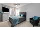 Comfortable bedroom featuring soft carpet, ceiling fan, and modern furnishings at 1286 Creekside Se Ter, Smyrna, GA 30082