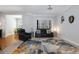 Spacious living area with stylish furnishings, a decorative rug, and ample natural light at 1286 Creekside Se Ter, Smyrna, GA 30082