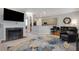 Open-concept living room with fireplace, bar, and comfortable seating, ideal for entertaining at 1286 Creekside Se Ter, Smyrna, GA 30082