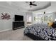 An open main bedroom featuring gray walls, carpet flooring, and decorative modern art at 1286 Creekside Se Ter, Smyrna, GA 30082
