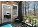Inviting patio featuring outdoor furniture, string lights, and scenic views beyond at 1286 Creekside Se Ter, Smyrna, GA 30082