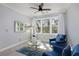 Sitting area with a large picture window and two chairs at 1286 Creekside Se Ter, Smyrna, GA 30082
