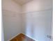 Empty walk-in closet with wire shelving and carpet flooring at 1531 Iris Walk, Jonesboro, GA 30238