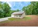 Charming single Gathering home showcasing a driveway, well-maintained yard, and a two-car garage at 1960 York Dr, Canton, GA 30114