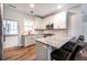 Charming kitchen features white cabinets, granite counters, and stainless steel appliances at 1960 York Dr, Canton, GA 30114
