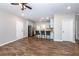 Open-concept living area with a modern kitchen, dark wood floors, and plenty of space for entertaining at 1960 York Dr, Canton, GA 30114