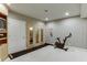 Finished basement with a sauna and exercise equipment, perfect for recreation at 3284 Bakers Mill Ct, Dacula, GA 30019