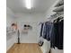Walk-in closet with custom shelving offering plenty of room for storage at 3284 Bakers Mill Ct, Dacula, GA 30019