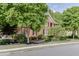 Attractive brick house with well-manicured landscaping and a tree-lined street at 3284 Bakers Mill Ct, Dacula, GA 30019