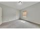 Bedroom featuring plush carpet, one window, and closet at 3792 Refinement Way, Douglasville, GA 30135