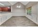 Dining area featuring a chandelier, wainscoting, and natural light at 3792 Refinement Way, Douglasville, GA 30135