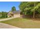 Charming home features a manicured lawn and a two-car garage at 3792 Refinement Way, Douglasville, GA 30135