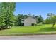 Exterior of a house with a manicured lawn and mature trees at 3792 Refinement Way, Douglasville, GA 30135