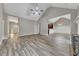 Open concept living room with high ceilings and hardwood floors at 3792 Refinement Way, Douglasville, GA 30135