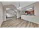Open concept living room and kitchen, high ceilings, and modern finishes at 3792 Refinement Way, Douglasville, GA 30135
