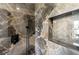 Close-up of a new shower niche showing off the marble tiling and built in shelf at 801 Arbor Hill Dr, Stone Mountain, GA 30088