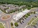 Aerial view of The Towns at East Village, a community with retail and residential buildings at 1094 Township Sq, Alpharetta, GA 30022