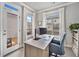 Bright home office with natural light, desk, and view of the deck at 1094 Township Sq, Alpharetta, GA 30022