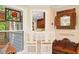 Charming breakfast nook features decorative accents and easy access to the adjacent kitchen at 226 Nacoochee Dr, Woodstock, GA 30188