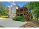 Beautiful two-story home with a two car garage, porch and backyard deck at 226 Nacoochee Dr, Woodstock, GA 30188