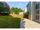 A well maintained backyard with a beautiful blooming tree at 306 Burdock Trce, Woodstock, GA 30188