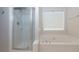 Bathroom featuring a separate shower and soaking tub at 306 Burdock Trce, Woodstock, GA 30188