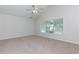 Spacious bedroom with vaulted ceiling and large window at 306 Burdock Trce, Woodstock, GA 30188