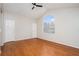 Spacious bedroom with hardwood floors, vaulted ceiling, and a large window at 4400 Old Allgood Cir, Stone Mountain, GA 30083