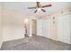 Neutral bedroom featuring carpet, ceiling fan, and closet at 5509 Park S Pl, Atlanta, GA 30349