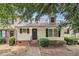 Charming townhome features a welcoming entrance and well-maintained landscaping at 5509 Park S Pl, Atlanta, GA 30349